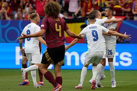 Slovakia's players celebrates opening goal